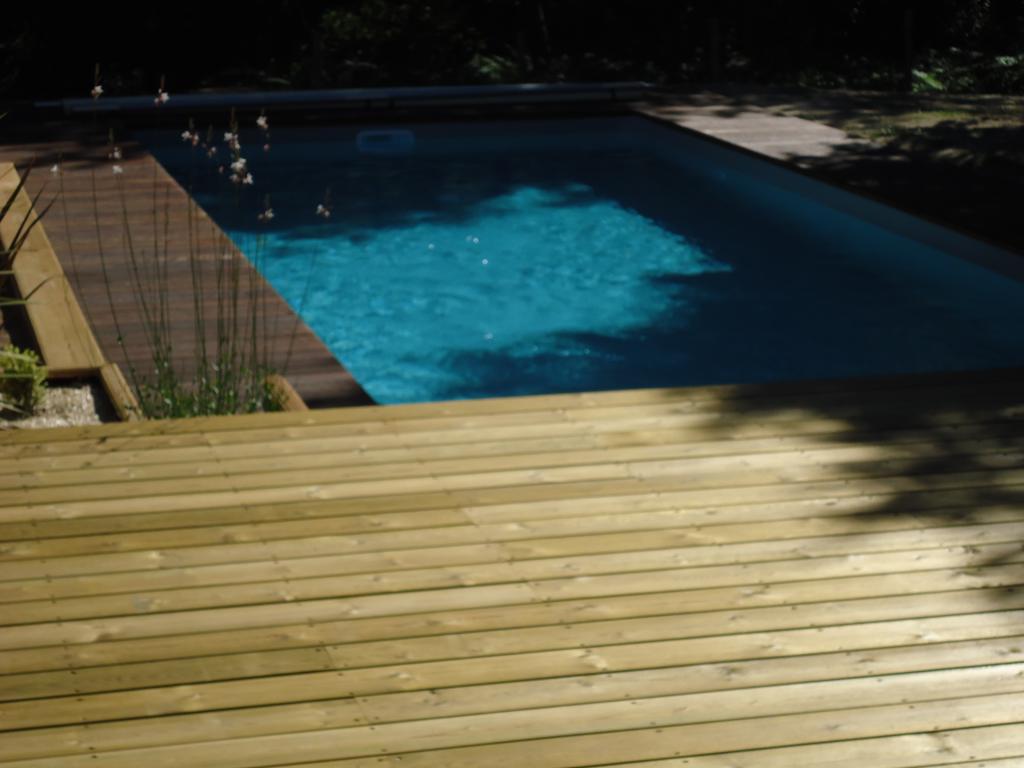 terrasse en pin US et tour de piscine en Itauba à Lüe (40210)